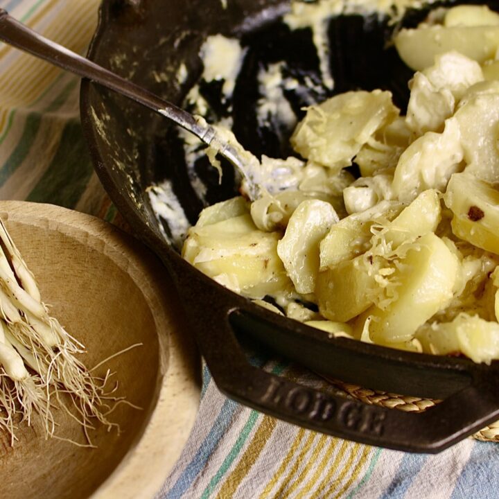 skillet with creamy potatoes