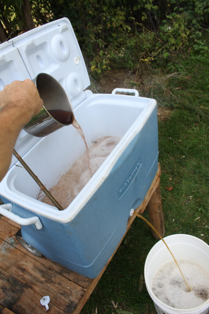 lautering mash to brew beer