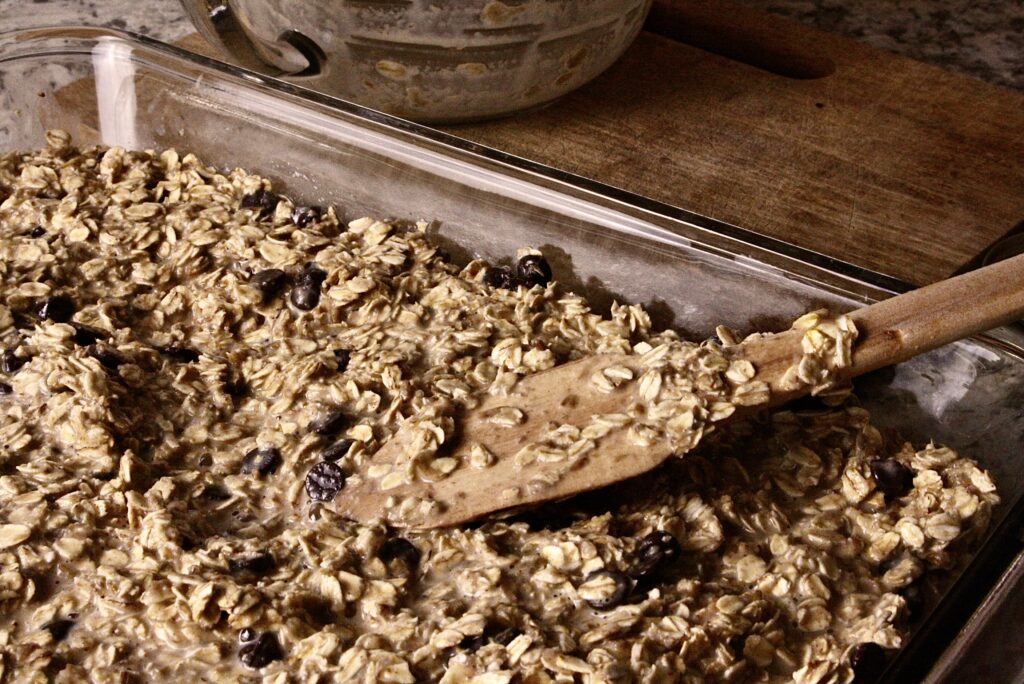 unbaked oatmeal in glass pan