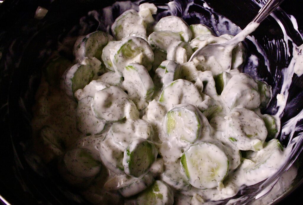 creamy cucumber salad in a bowl