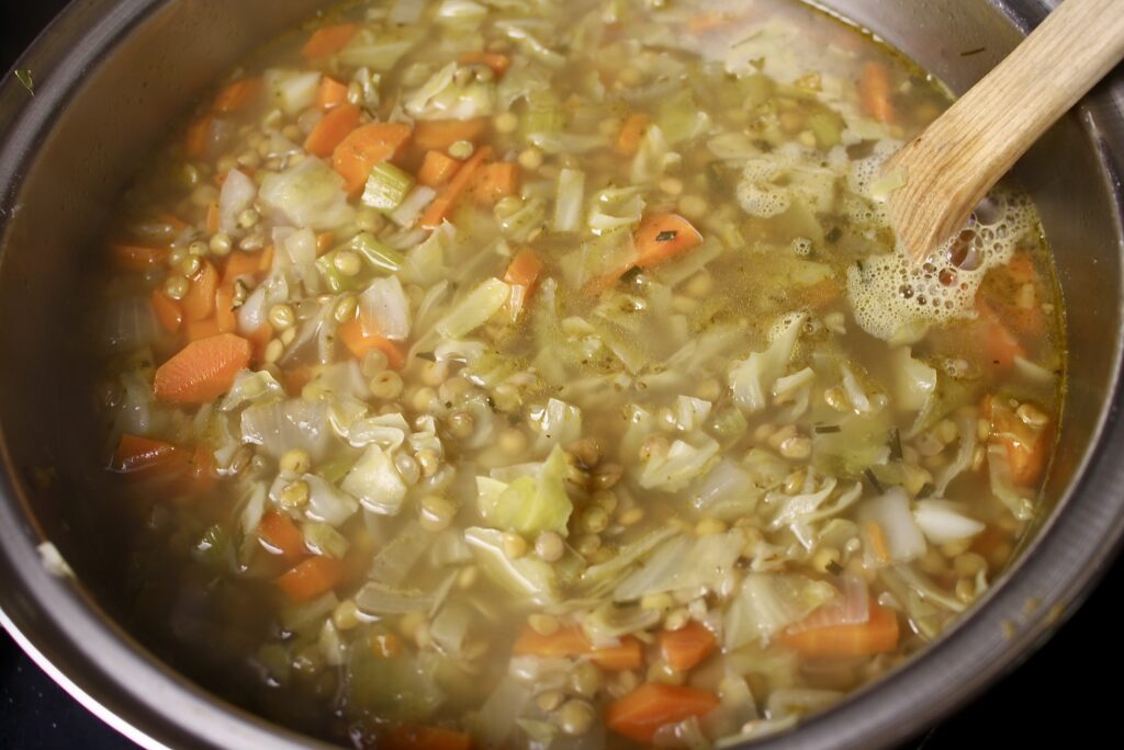 cabbage and lentil soup in a pot