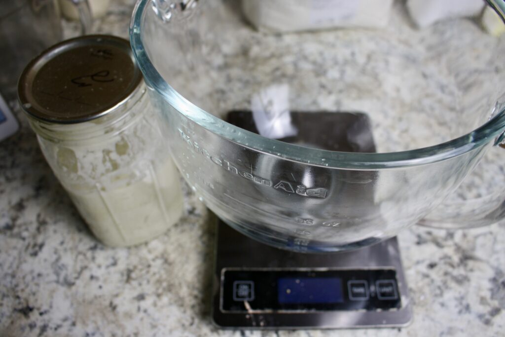 clear bowl on a kitchen scale