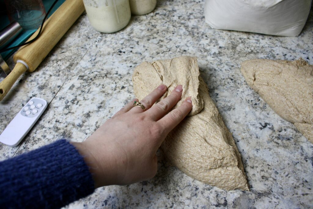 hand shaping dough