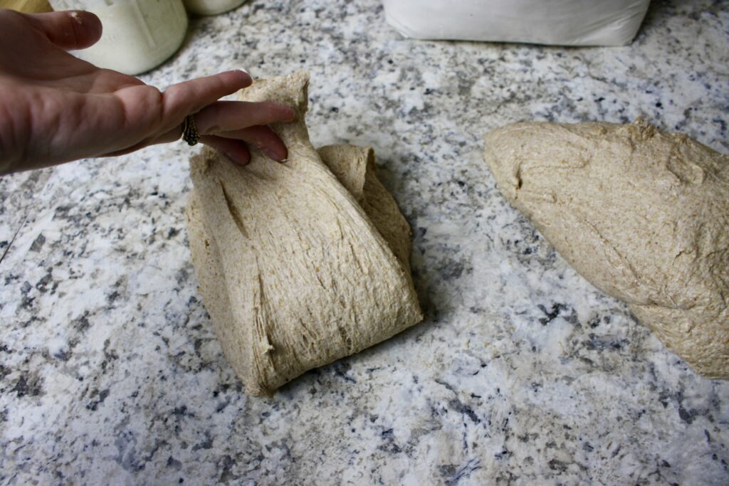 hand shaping sourdough