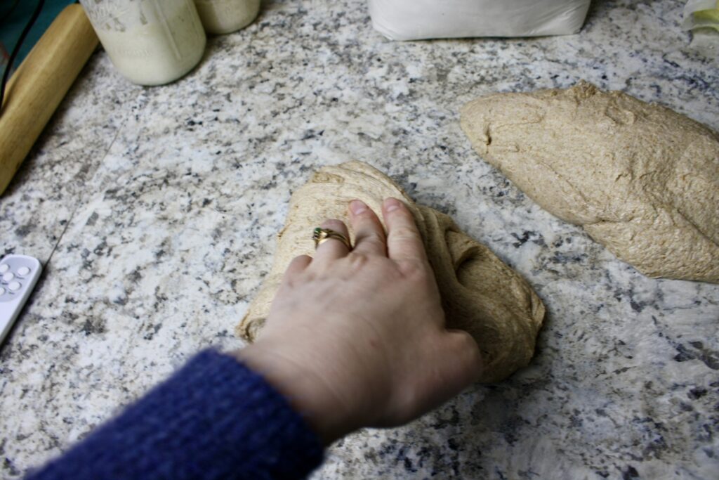 hand folding dough