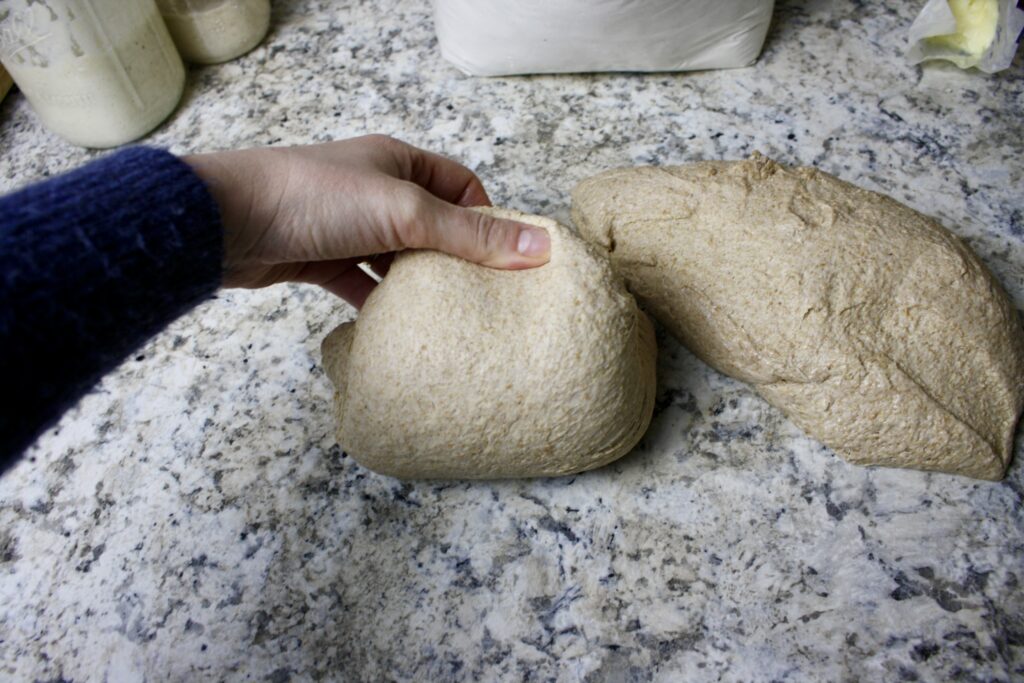 hand making ball of dough