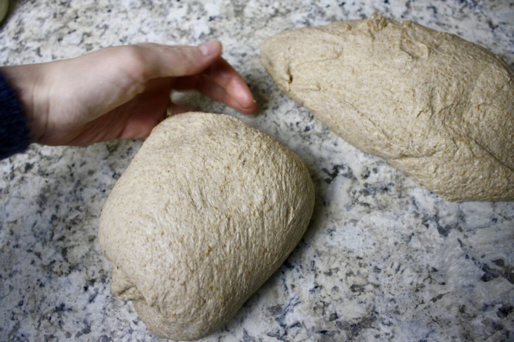 hand making ball of dough