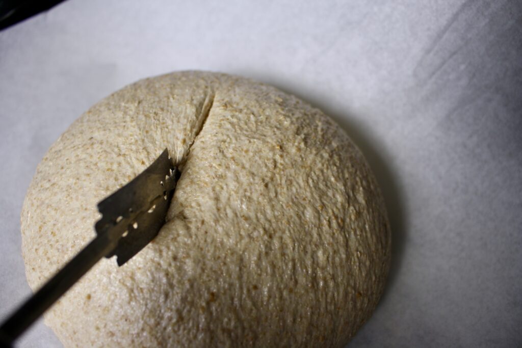 blade scoring sourdough loaf