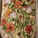 summer sourdough focaccia with flower design made of vegetables