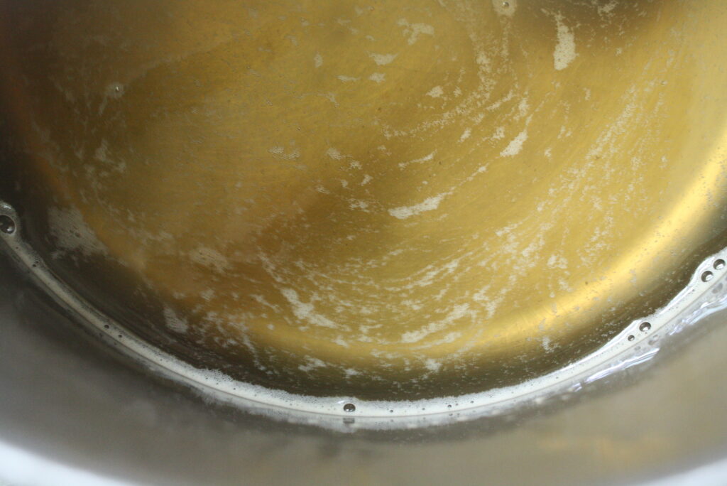 sugar and water mixed in a pan