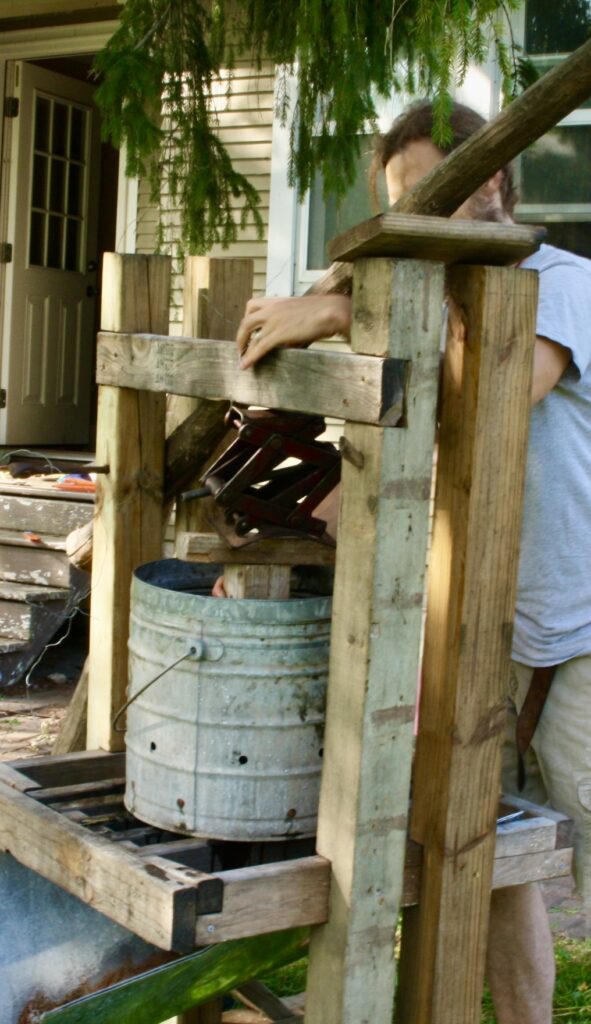 a apple press made with a car jack 