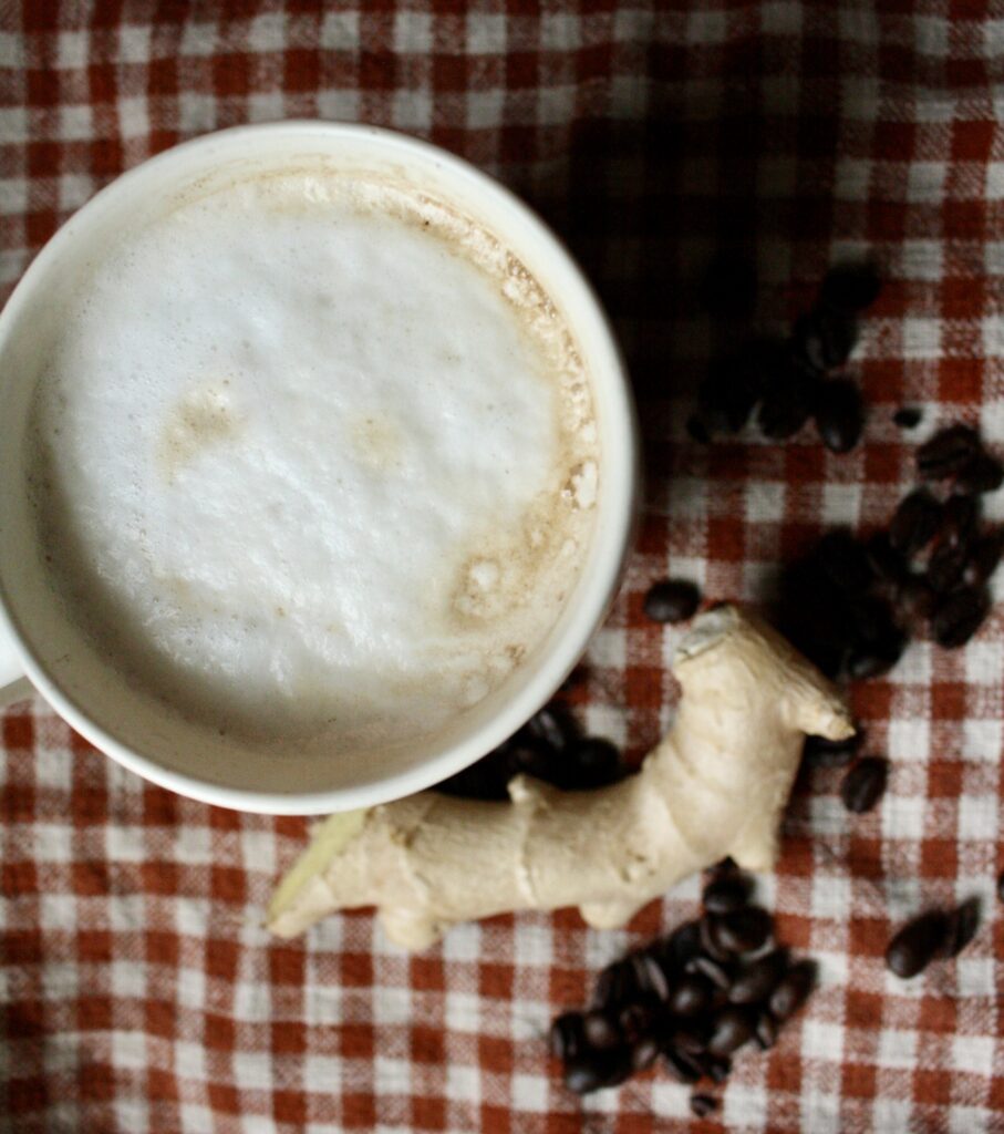 cup of hot ginger coffee on a cloth