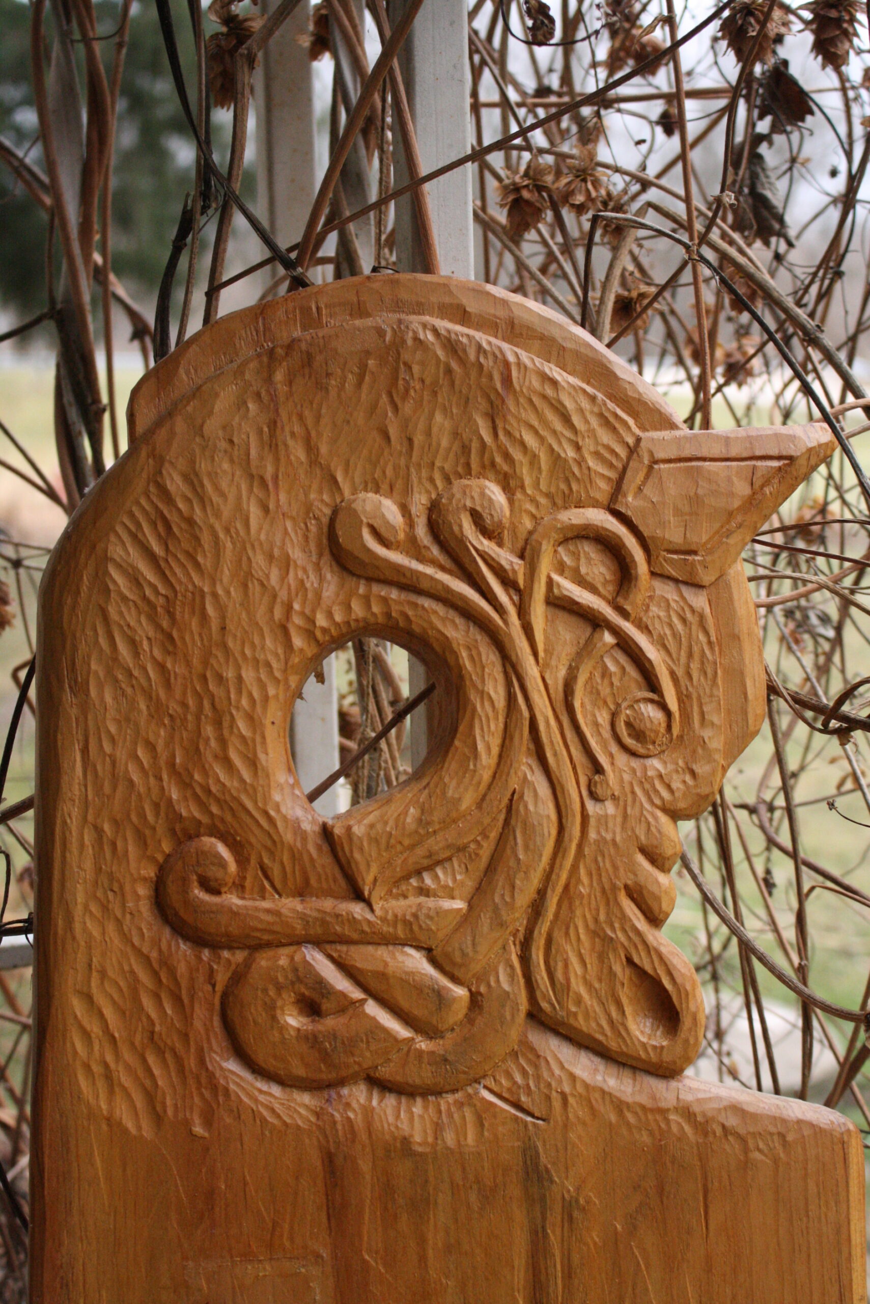 A wooden carved Norse dragon head 