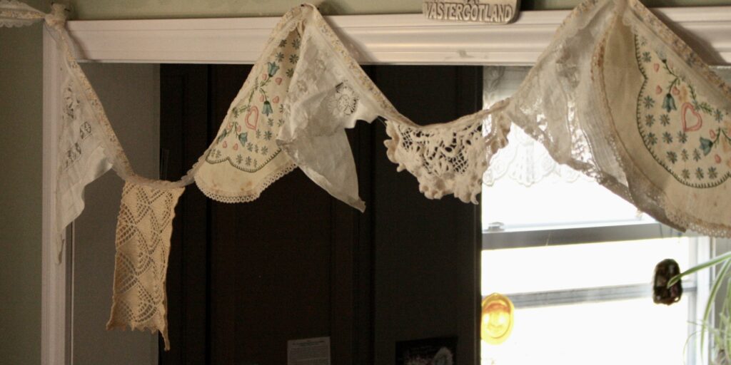 Lace bunting hanging over a doorway