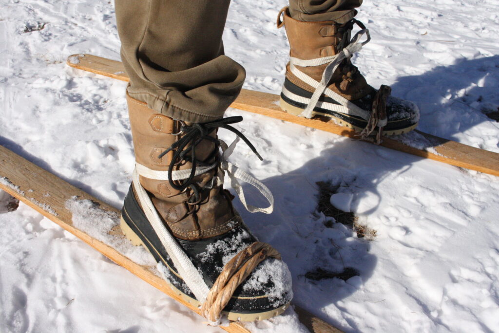 modern snow boots in the traditional ski bindings